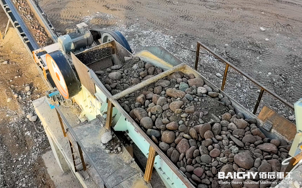 Peruvian High-Abrasion River Pebble Crushing Project: Closed-Circuit System Design for Bond Wi 18 and High Quartz Content