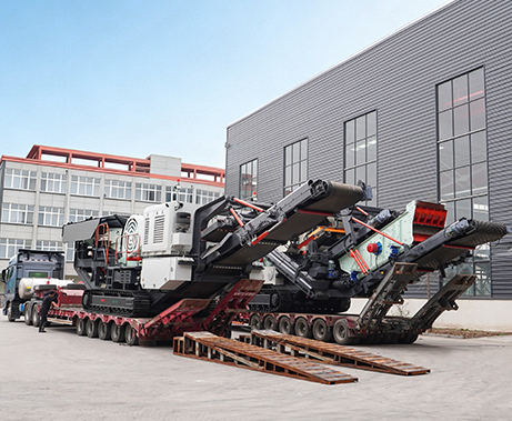Track-mounted crushing station being shipped.